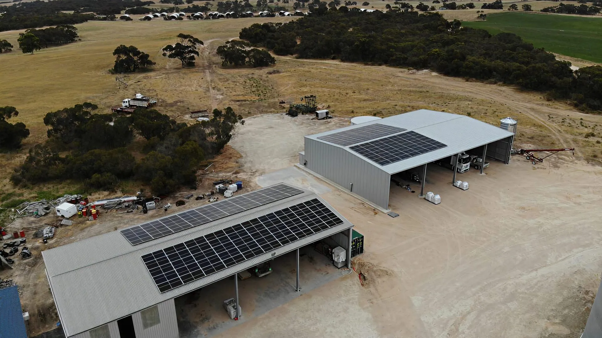 Aerial view of a shed with solar panels for rebates and incentives