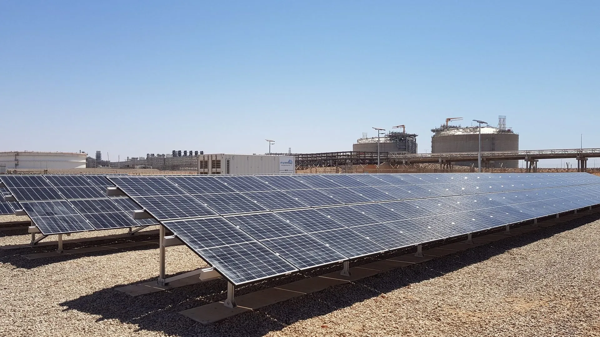 Ground-mounted solar array at an industrial site