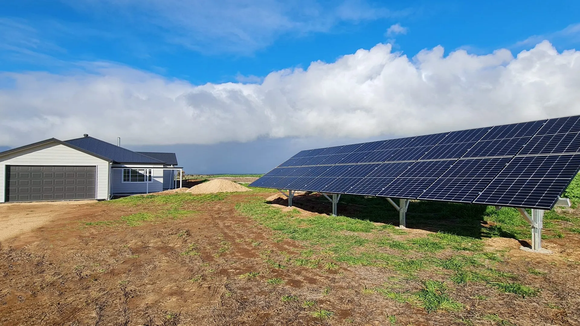 Off-grid home with a ground-mounted solar array