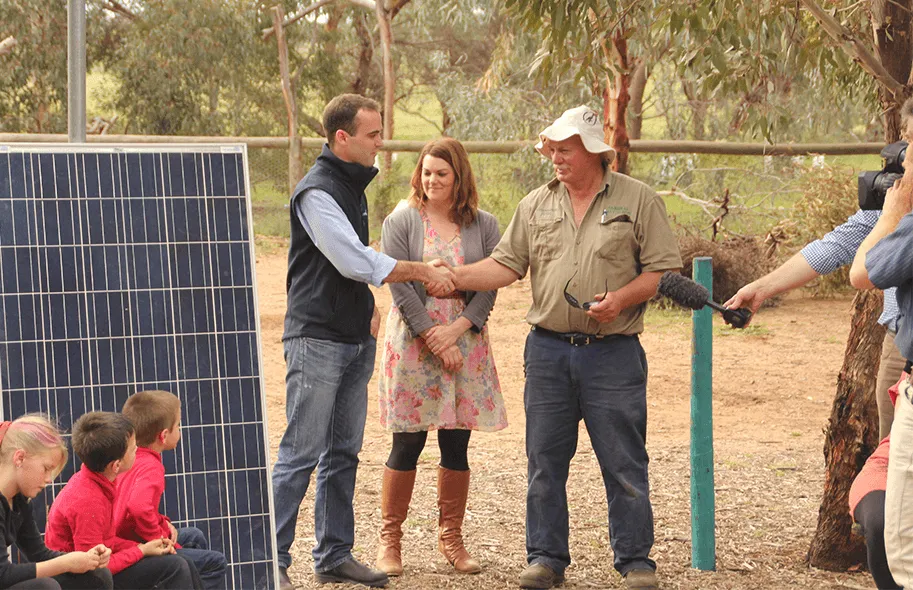 Community event with Off-Grid Energy team and solar installation