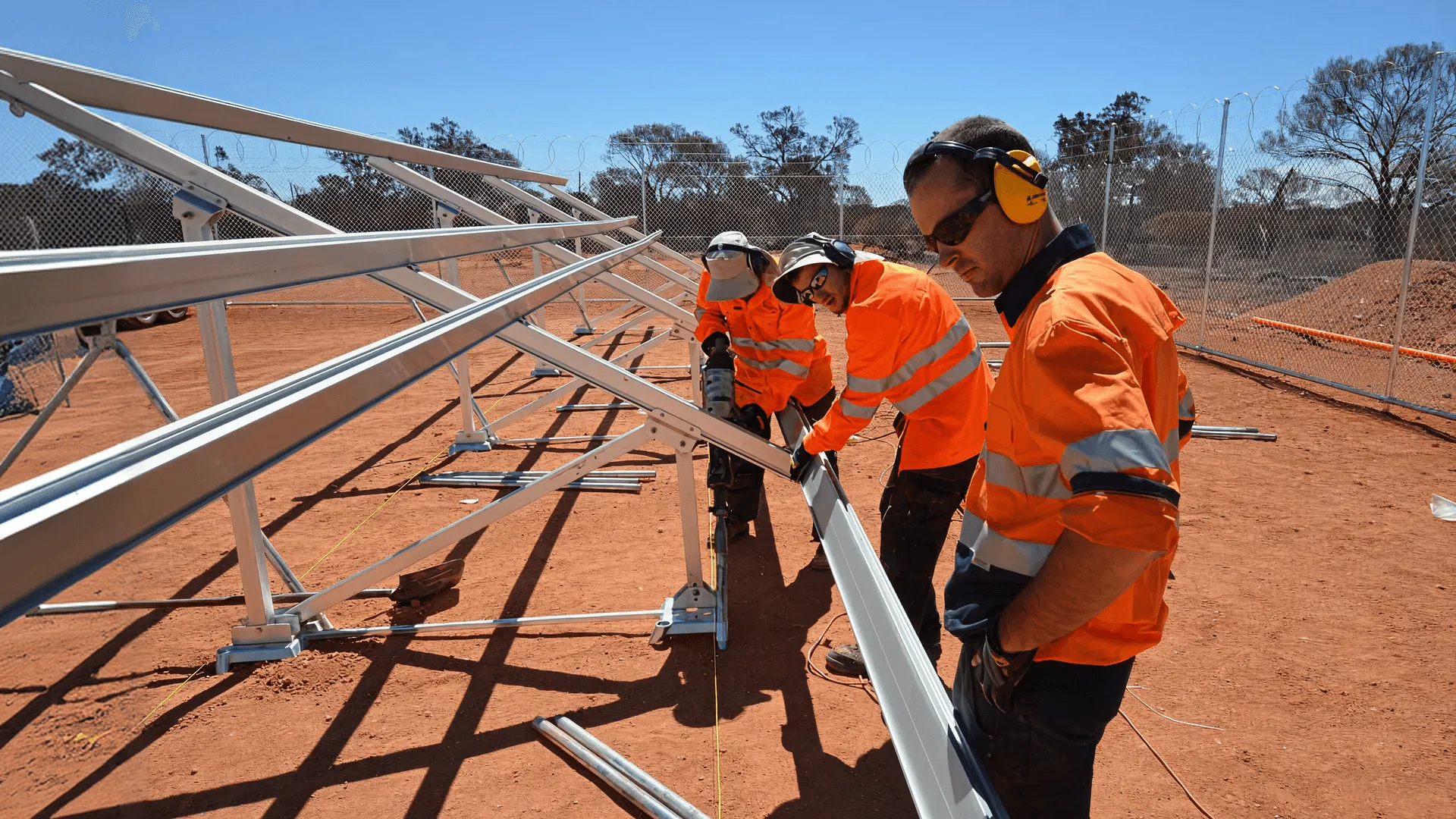 Off-Grid Energy Australia team installing solar racking