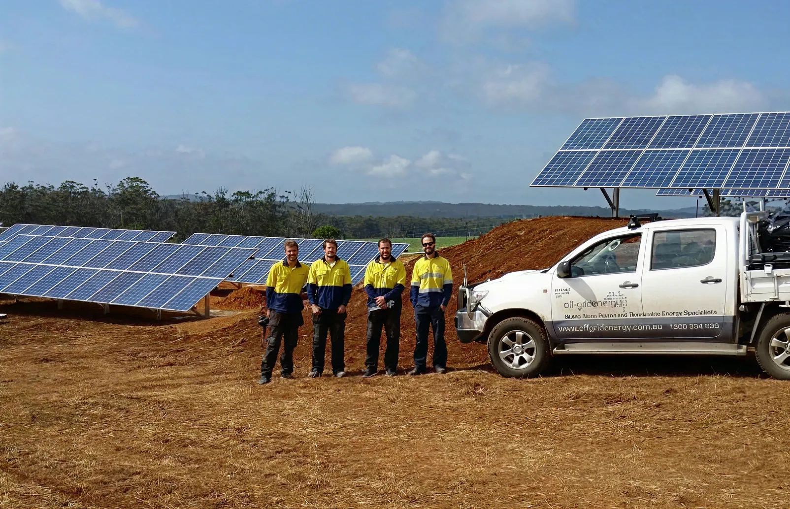 Off-Grid Energy team with a mobile solar and battery system